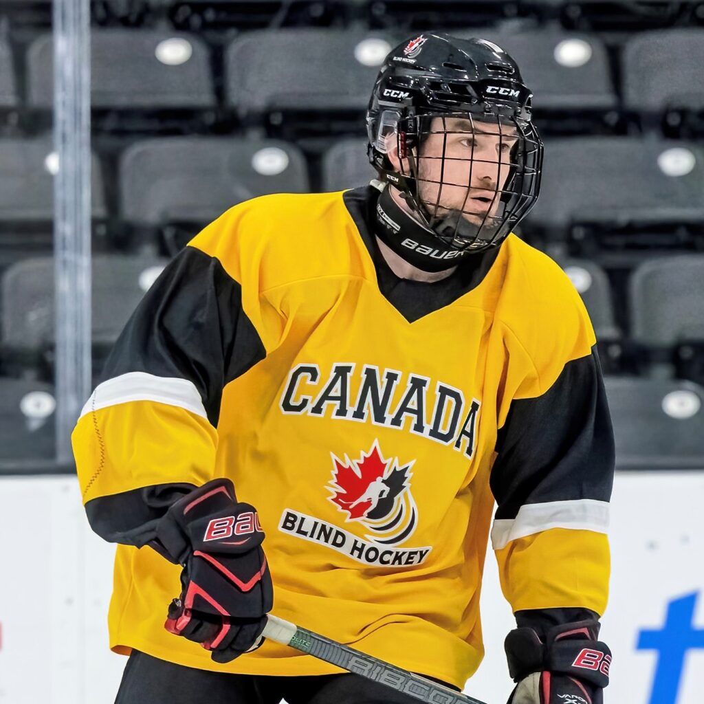 Conrad Eder playing blind hockey