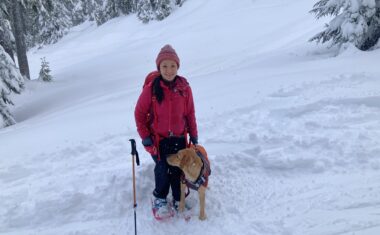 Dr. Ruanne Lai and her dog Portia snowshoeing