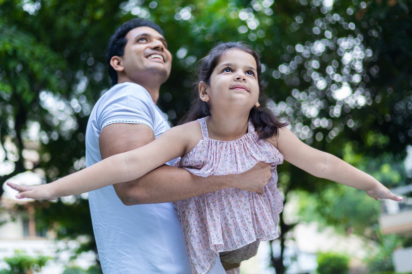 father and child playing