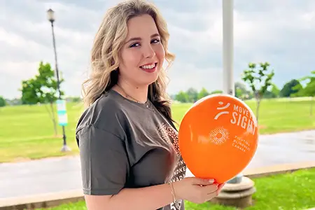 young woman with balloon