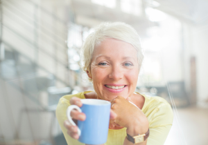 Older woman drinking coffee